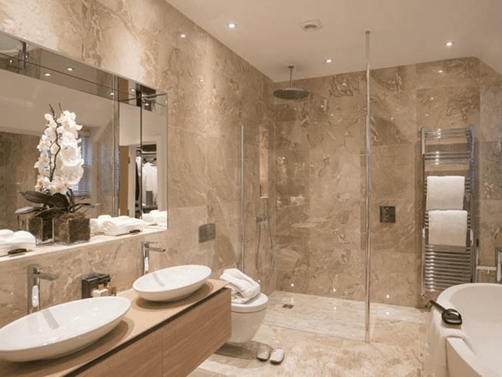 Spa-style marble bathroom, representational of the wellness experience at DLF Privana North